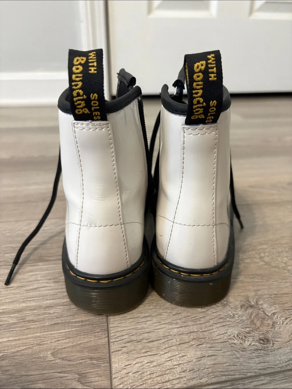 Dr. Martens White Patent Lace-Up Boots with Black Trim